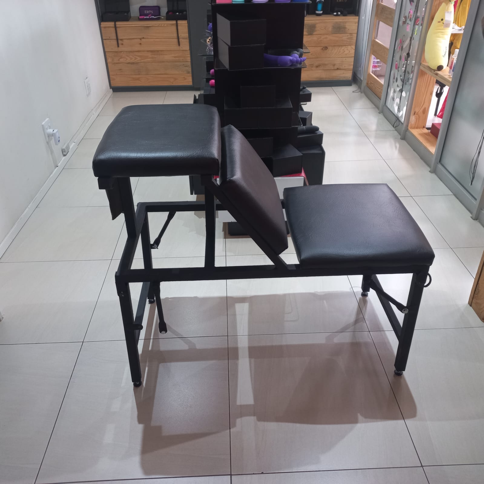 Custom steel BDSM furniture — folding spanking bench