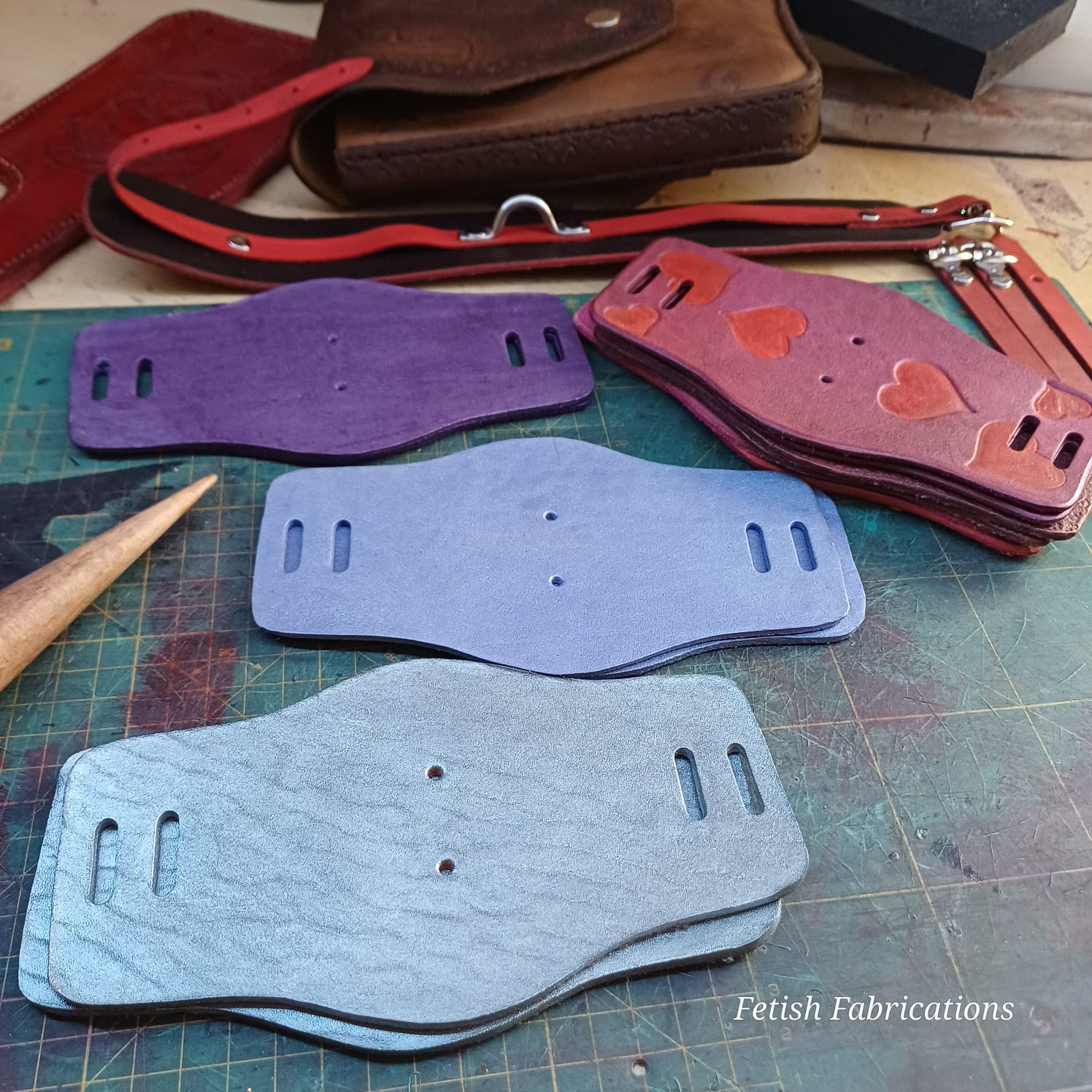 Custom leather cuffs by Fetish Fabrications